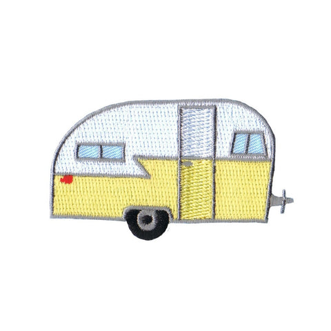 Embroidered retro-style travel trailer patch in yellow, white, black, and gray with a small red accent, shown on a plain white background.