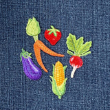 Embroidered fruit and vegetable patches on denim fabric