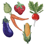 Set of embroidered vegetable and fruit patches on a white background