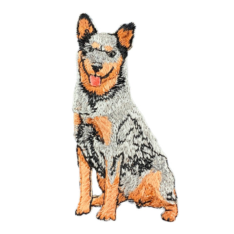 A small embroidered Australian Cattle Dog patch in tan, black, and gray sits on a white background.