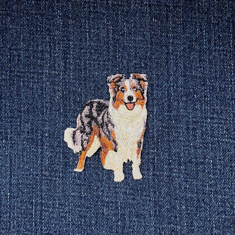 Australian Shepherd patch on a denim background
