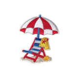 Embroidered patch of a beach scene with a striped umbrella, chair, and bag on a white background.