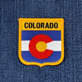 Colorado state emblem patch on a denim background