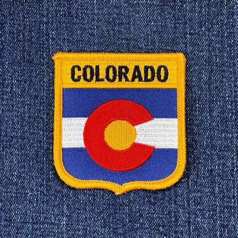 Colorado state emblem patch on a denim background