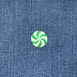 green peppermint candy patch on denim fabric