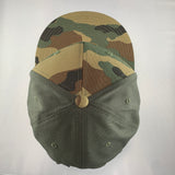 Camouflage baseball cap on a white background