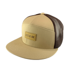 Beige cap with brown mesh and 'Let's Be Irie' patch on a white background