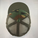 Green cap with camouflage front and olive tone mesh back on a light gray background