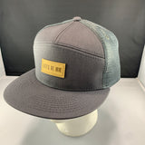Gray cap with a 'Let's Be Irie' patch on a black background