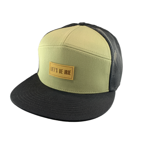 Loden and black cap with a "Let's Be Irie" patch on a white background