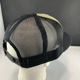 Black mesh cap on a mannequin head against a gray background