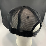 Black mesh cap on a mannequin head with a dark gray background