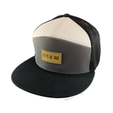 Gray white and black cap with a beige 'Let's Be Irie' patch on a white background
