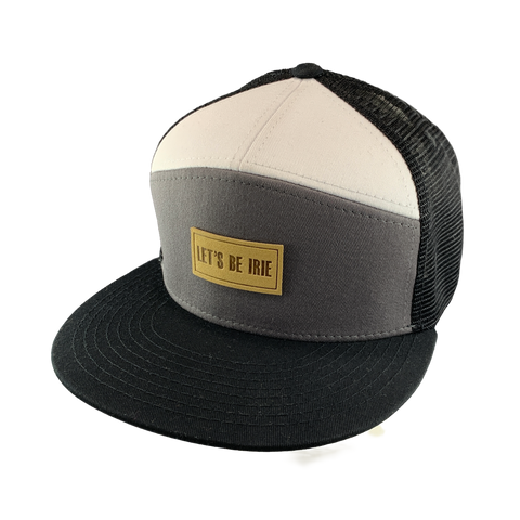 Gray white and black cap with a beige 'Let's Be Irie' patch on a white background