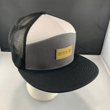 Gray white and black cap with a beige 'Let's Be Irie' patch on a black background