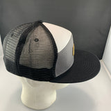 Gray white and black cap with a beige 'Let's Be Irie' patch on a black background