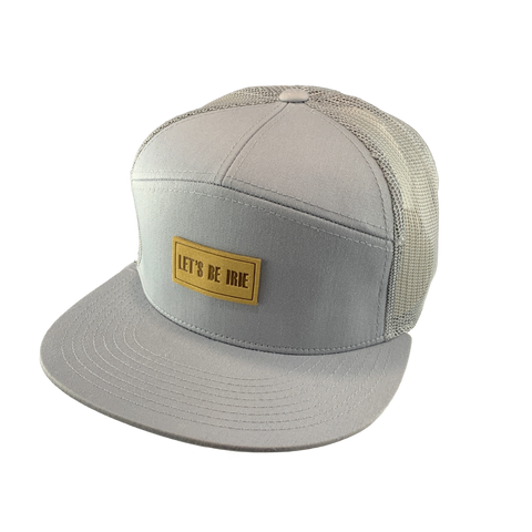 Gray cap with a beige 'Let's Be Irie" patch on a white background