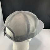 Gray mesh cap on a mannequin head with a black background