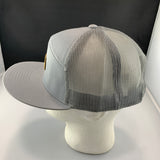Gray mesh cap on a mannequin head with a black background