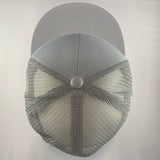 Gray cap with textured front panel on a light gray background