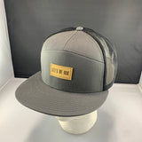Gray cap with a 'Let's Be Irie' patch on a black background