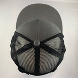 Gray cap with black mesh back on a light gray background