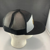 Black and gray cap with a 'Let's Be Irie' patch on a black background