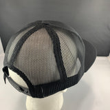 Black mesh cap on a mannequin head with a gray background