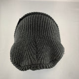 Dark gray knit beanie on a light gray background