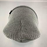 Gray knit beanie on a light gray background