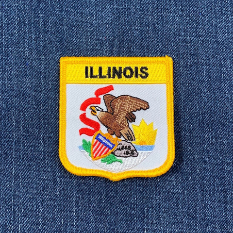 Illinois state emblem patch on a denim background