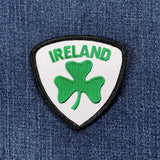Patch with 'Ireland' text and a green shamrock on a denim background
