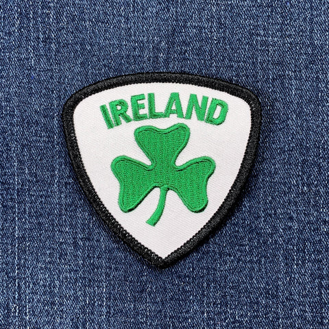 Patch with 'Ireland' text and a green shamrock on a denim background