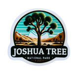 A vinyl decal featuring a stylized representation of Joshua Tree National Park with a tree and a sunset in the background, and the text 'JOSHUA TREE NATIONAL PARK' along with 'USA'.