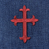 Large Burgundy Cross Applique Patch on a denim background