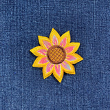 Sunflower patch on a denim background