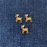 three miniature deer patches on a denim background