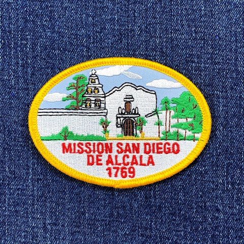 Embroidered patch of Mission San Diego de Alcala on denim fabric