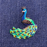 Peacock patch on denim fabric