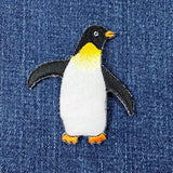 Penguin patch on denim fabric
