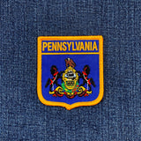 Pennsylvania state emblem patch on a denim background