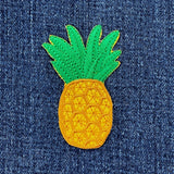 Pineapple patch on denim fabric