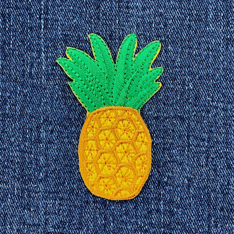 Pineapple patch on denim fabric
