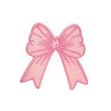 Pink bow-shaped patch on a white background