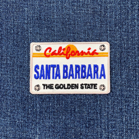 Patch with 'California Santa Barbara' text on a denim background