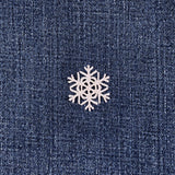 Snowflake patch on denim fabric