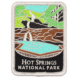 Embroidered patch of Hot Springs National Park depicting a waterfall and nature scene