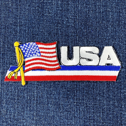 Embroidered patch with American flag and 'USA' text on denim fabric