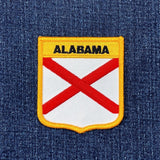 Alabama flag patch on a denim background