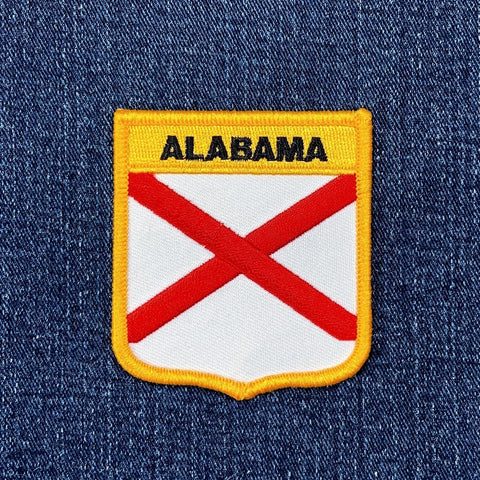 Alabama flag patch on a denim background